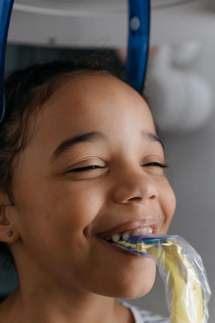 close up shot of a girl having a dental checkup