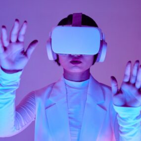 a woman wearing a virtual reality goggles